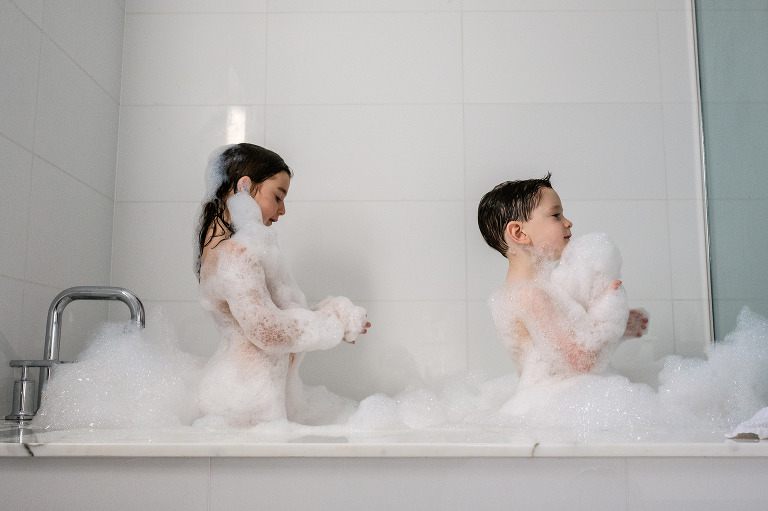 kids in bubble bath standing